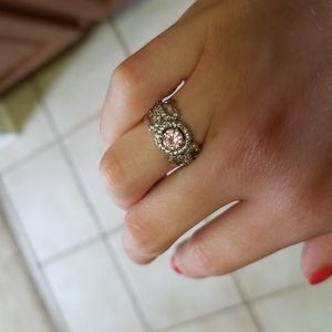 Silver ring with pink rhinestone center